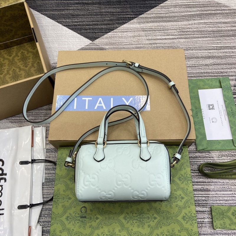 G*u*i top handle bags